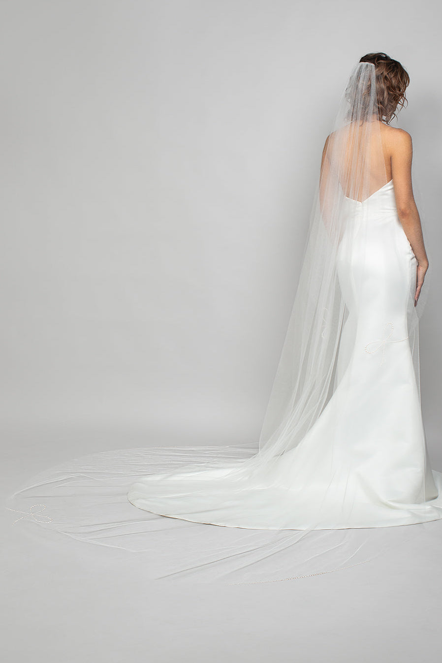 Cathedral Wedding Veil with Austrian Pearl bows placed along the border