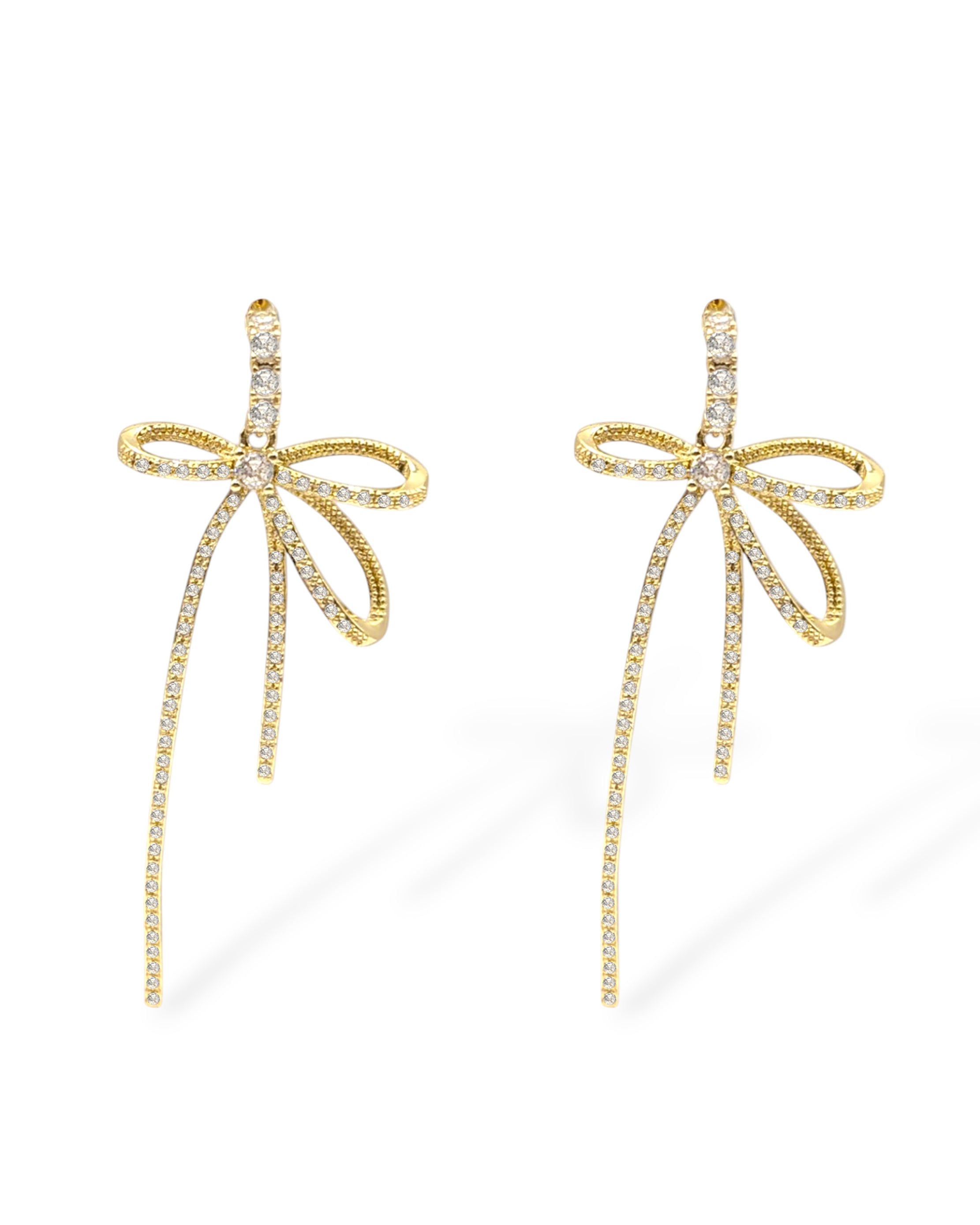 Summer bow earrings in gold with pavé cubic zirconia crystals and long drop design