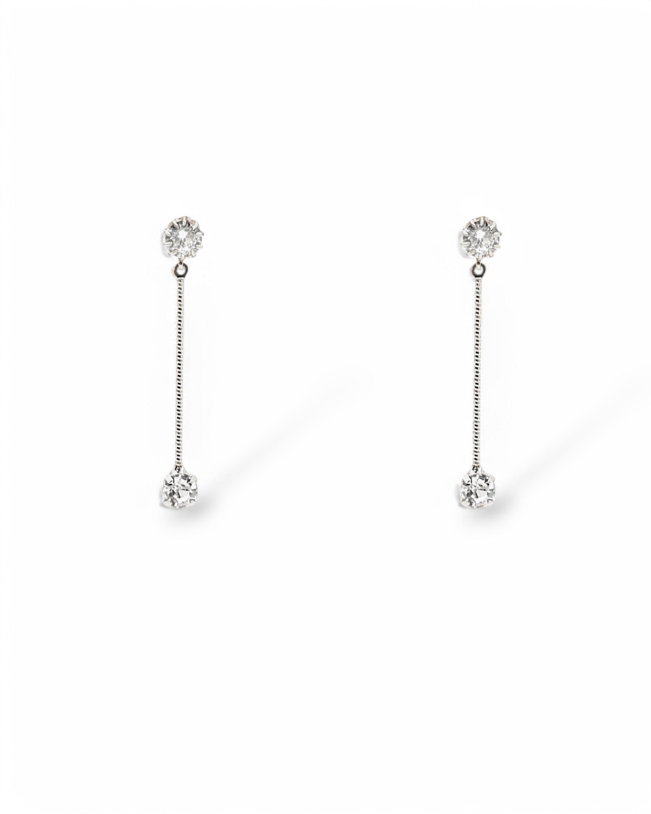 Sylvia silver earrings with CZ crystal bar drops on white background