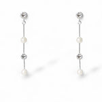 Tori silver pearl and crystal drop earrings by Ariel Taub