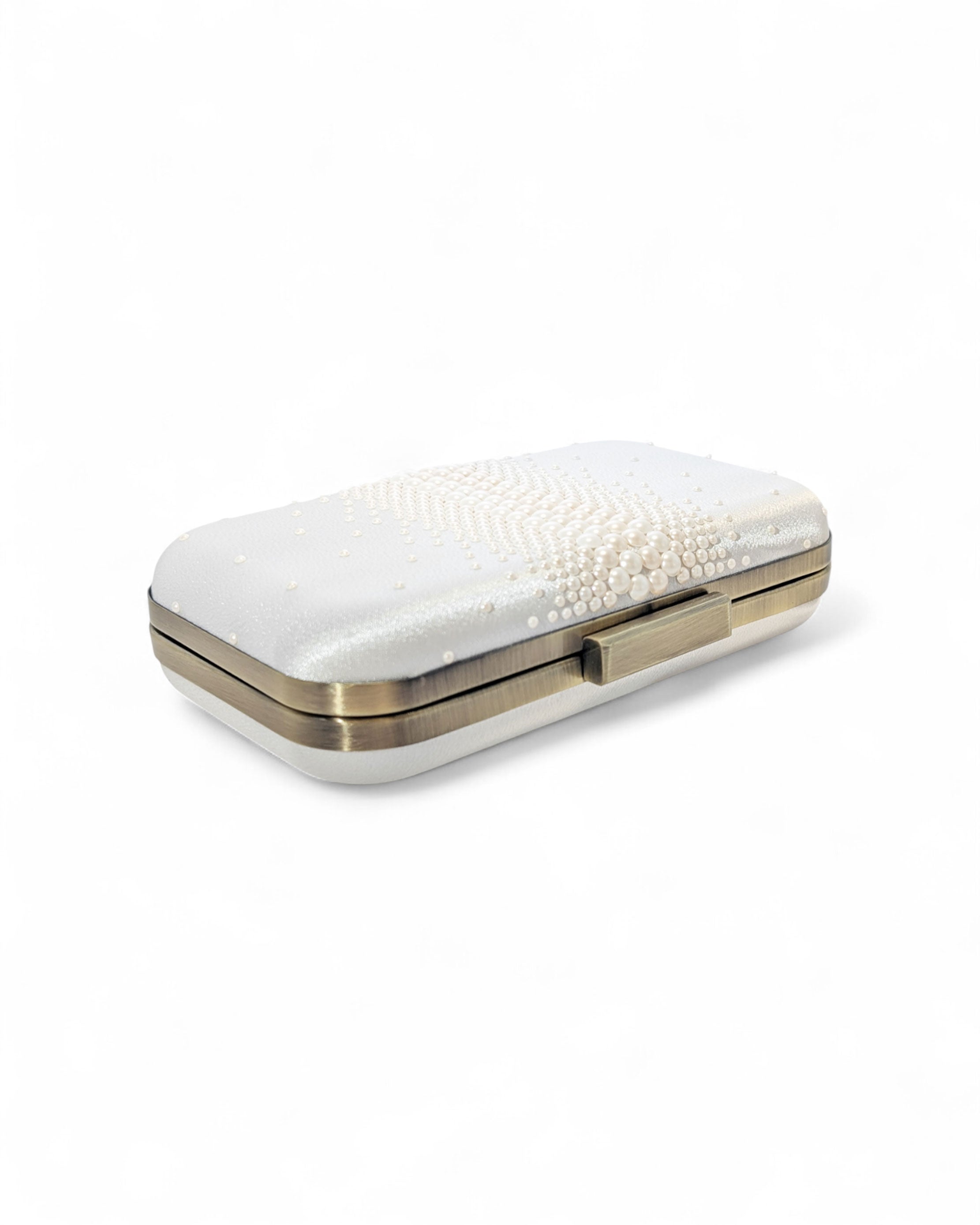 Top View Off-white satin bridal clutch with Austrian pearl embellishments and antique brass frame by Ariel Taub — Tresor Clutch.