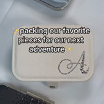 Showing what you can put in the crystal monogram travel jewelry box in sparkle ivory.