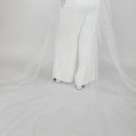 Cathedral length wedding veil showing the detailing of the Austrian pearl bows on the train and sides of the bridal veil