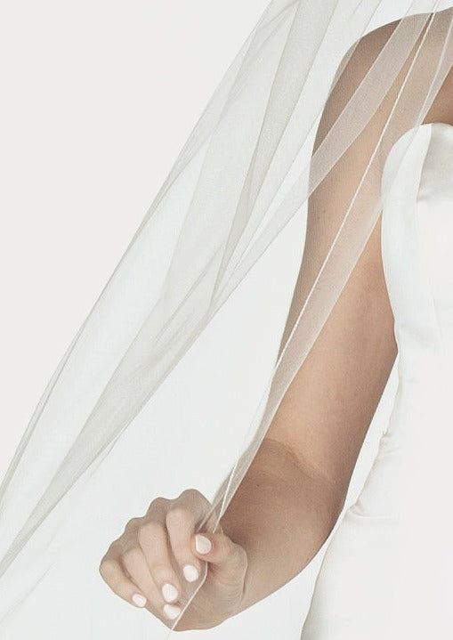 Detail of the serged pencil edge design of this wedding veil.