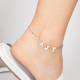 Personalized Opal monogram pearl anklet featuring mother of pearl letters and a delicate heart silver chain, perfect for adding a touch of elegance to bridal, beach, or everyday outfits.