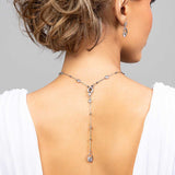 Model wearing the CZ crystal Presley lariat necklace in the back paired with the matching Perry earrings