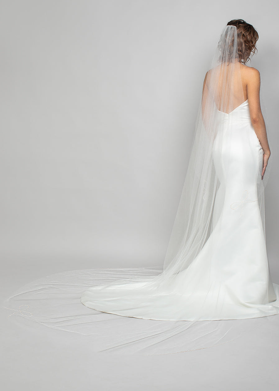 Cathedral Wedding Veil with Austrian Pearl bows placed along the border