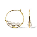 Front and side views of the Rio large gold-plated hoop earrings with floating Austrian pearls, perfect for modern fashion looks.