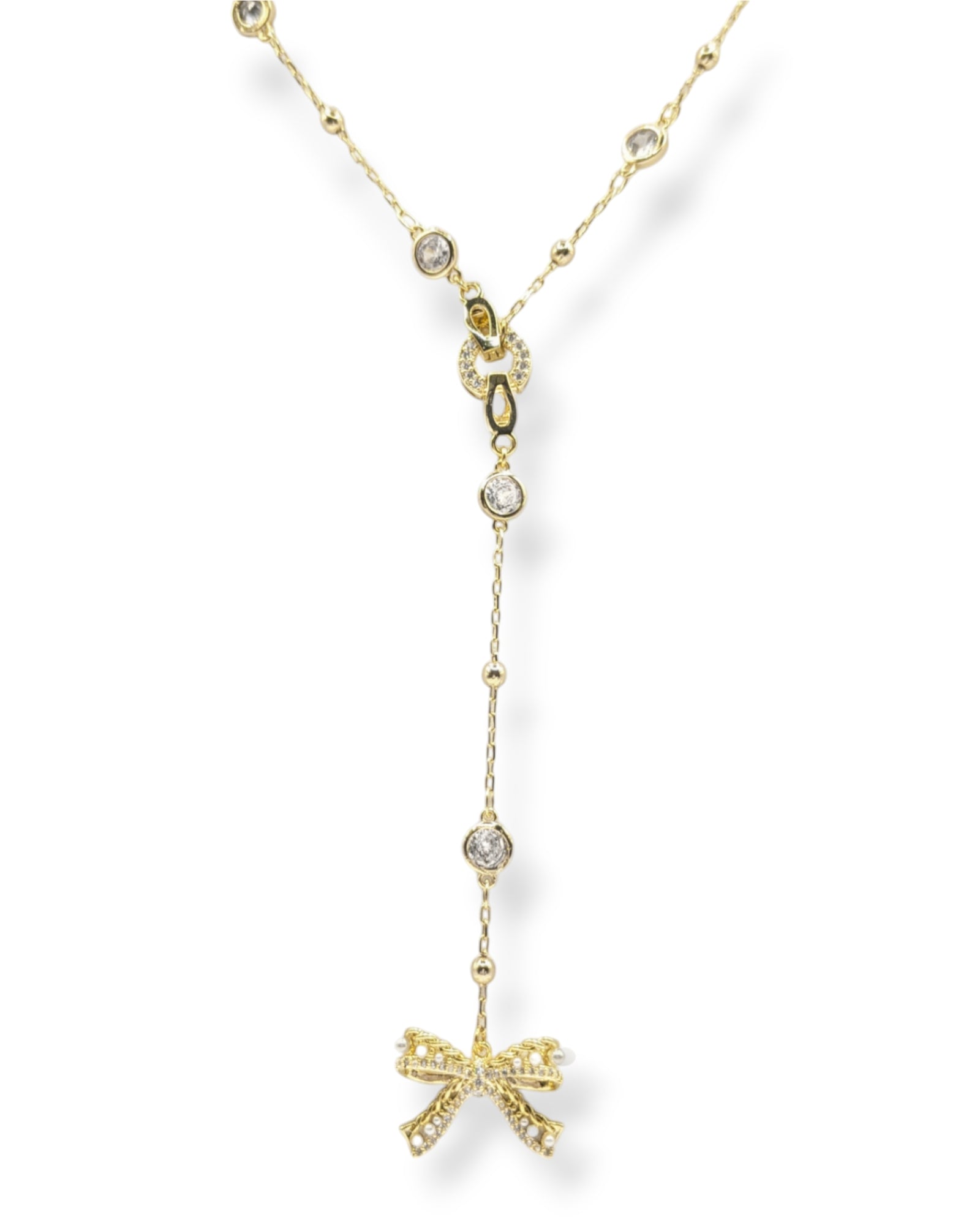 Gold Ryan Y-necklace showcasing its detachable pave crystal bow pendant for a unique and modern bridal or fashion statement.