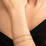 Spencer bracelet on model in silver