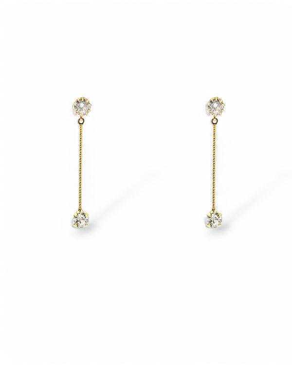 Sylvia gold earrings with CZ crystal bar drops on white background