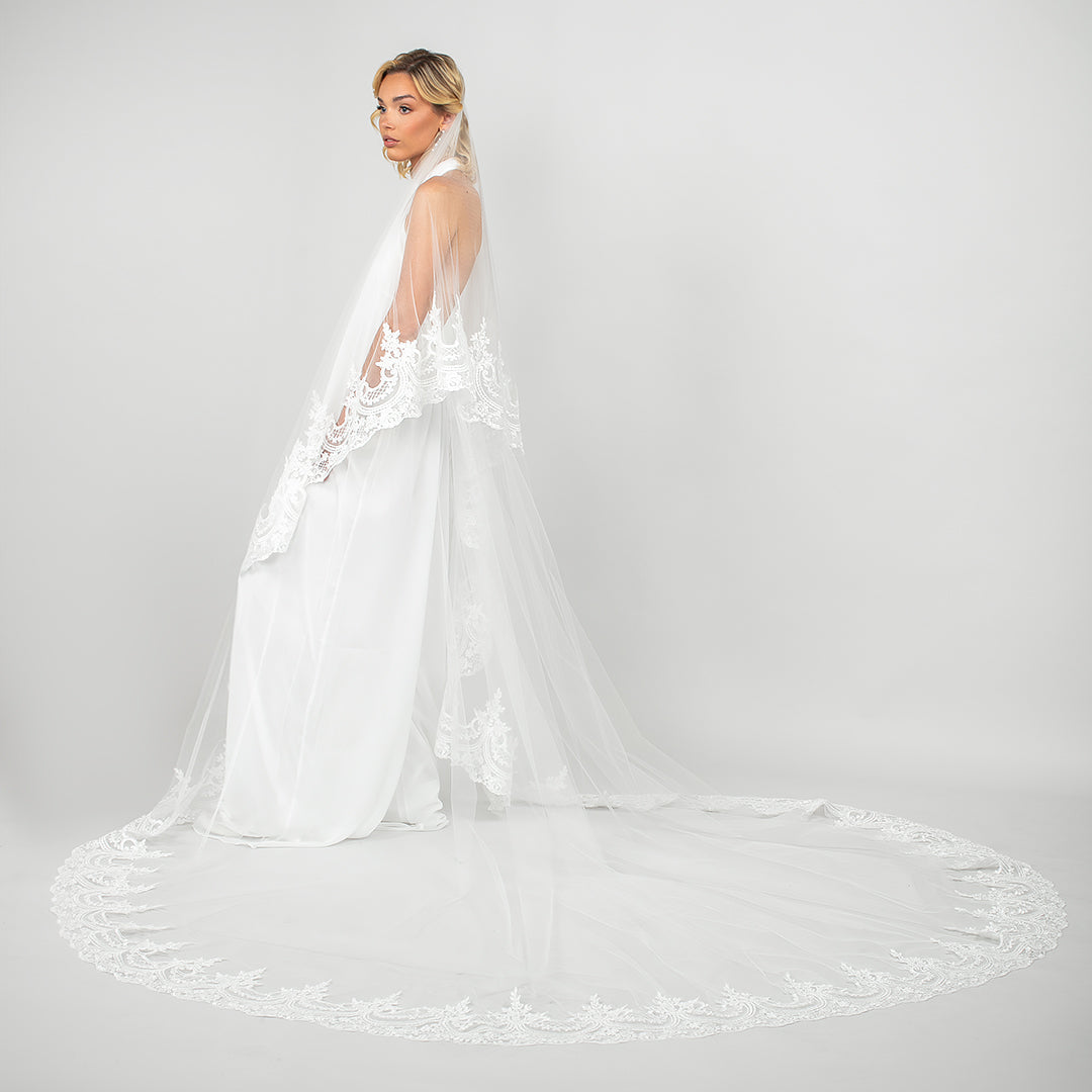 Cathedral-length train of the Tiana veil featuring intricate lace edging