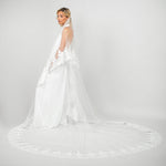 Cathedral-length train of the Tiana veil featuring intricate lace edging