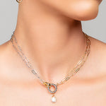 Close-up of Tiffany gold and silver mixed metal choker by Ariel Taub