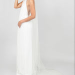 Model wearing the Tinsley chapel-length veil with scattered Austrian crystals by Ariel Taub