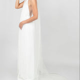 Model wearing the Tinsley chapel-length veil with scattered Austrian crystals by Ariel Taub