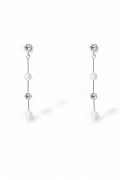 Tori silver pearl and crystal drop earrings by Ariel Taub