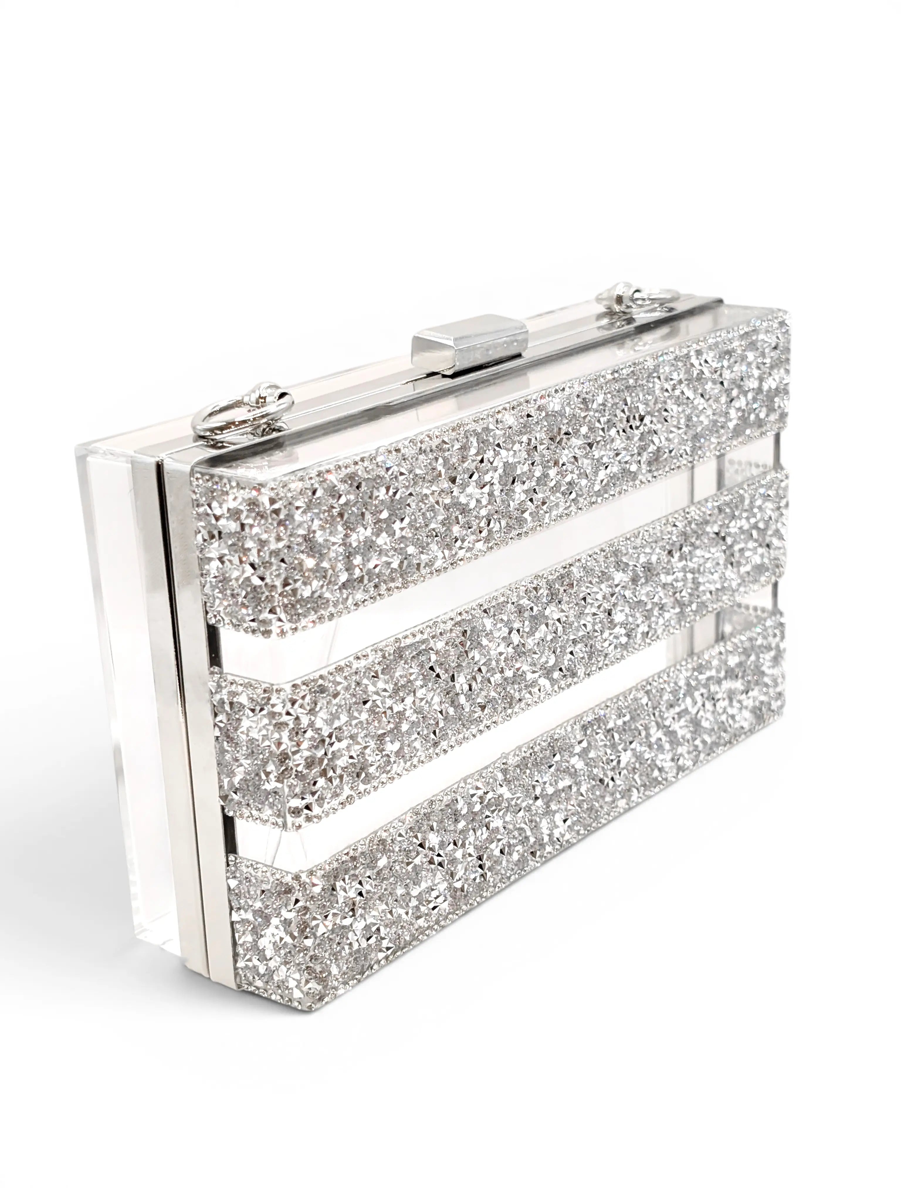 Silver glittery clutch bag on a white background