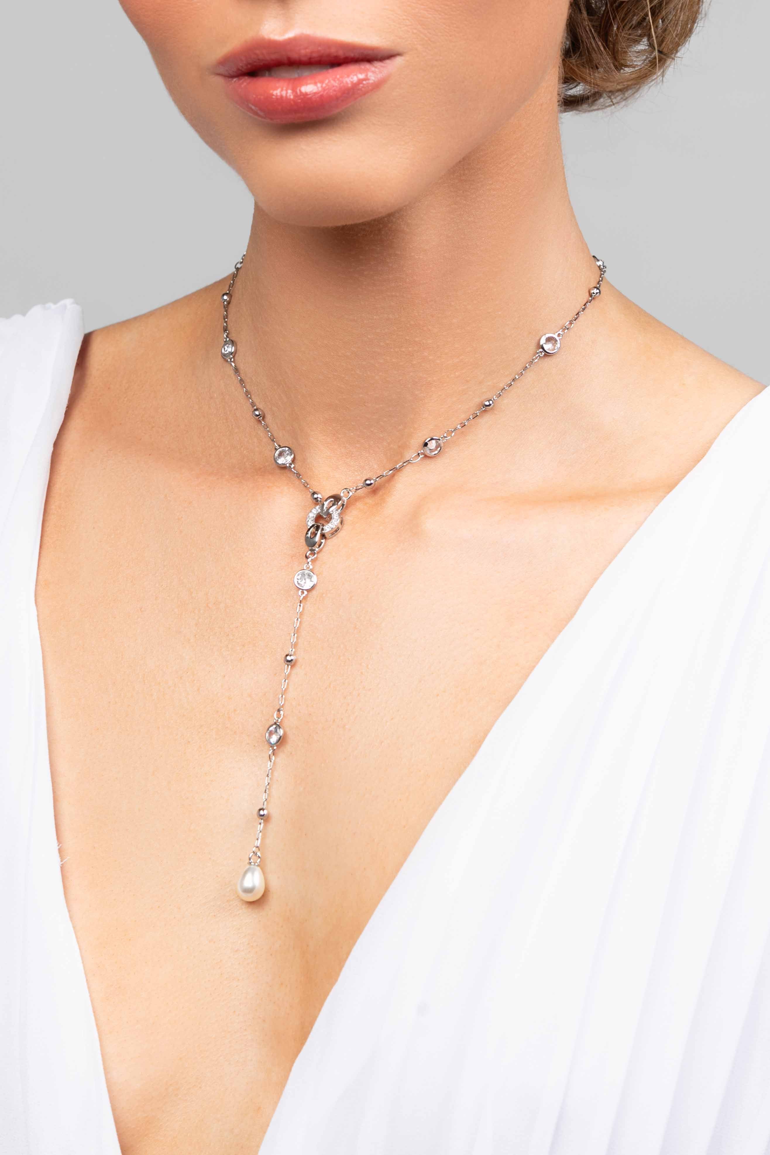 How to attach charms to the signature Ariel Taub charm and choker lariat necklace. Charms shown Presley and Ryan pendants.