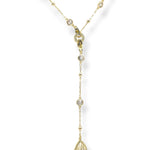 Reed crystal Y-necklace with a detachable teardrop crystal charm allowing it to transition to a choker necklace shown in gold