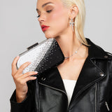 Black and silver ombre Austrian crystal clutch with satin fabric lining, designed for evening affairs and modern elegance. Paired with the modern Riley pave crystal and pearl bow drop earrings in silver.