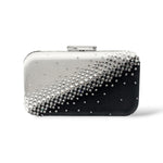 Black and silver ombre crystal minaudiere hard shell clutch with black satin fabric lining, designed for evening affairs and modern elegance to sparkle all night long.