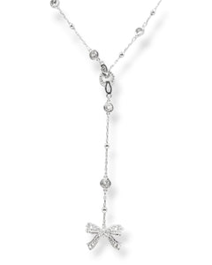 Silver Ryan Y-necklace showcasing its detachable pave crystal bow pendant for a unique and modern bridal or fashion statement.