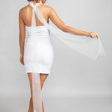 Model wearing the Savannah striped tulle scarf draped from the neck, showcasing the 54" fall down the back over a white strapless mini dress and white heels.