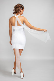 Model wearing the Savannah striped tulle scarf draped from the neck, showcasing the 54" fall down the back over a white strapless mini dress and white heels.