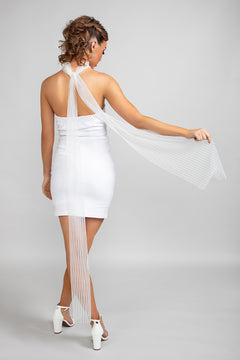 Model wearing the Savannah striped tulle scarf draped from the neck, showcasing the 54" fall down the back over a white strapless mini dress and white heels.