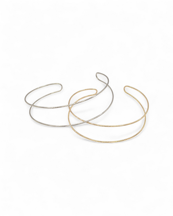Spencer cuff bracelets in gold and silver side by side