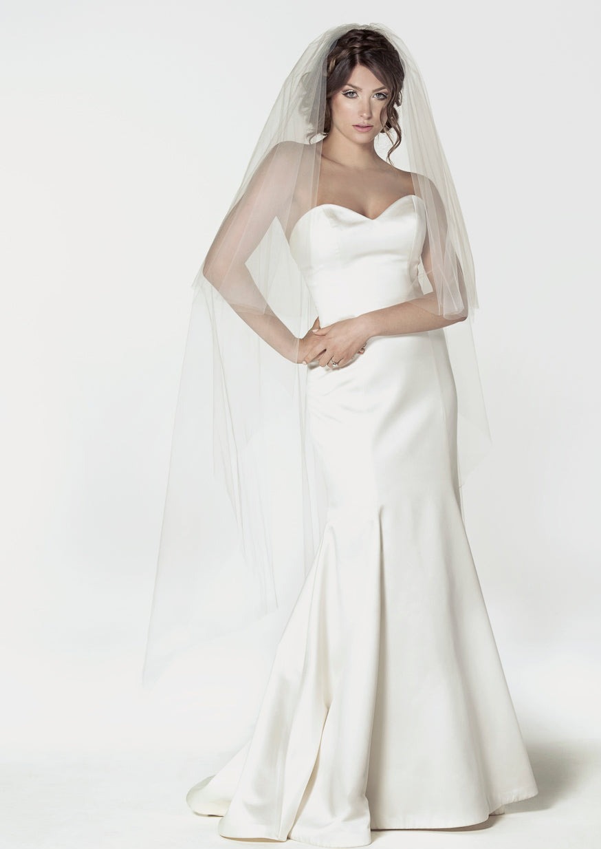2 tier waltz length wedding veil with a handkerchief cut.