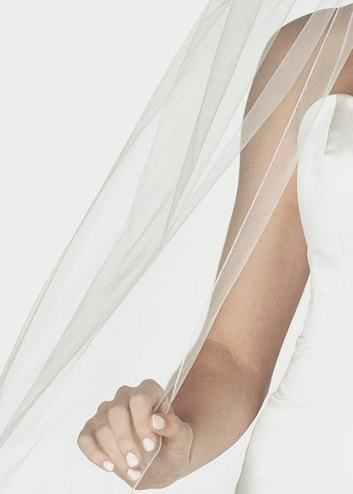 Detail of the serged pencil edge design of this wedding veil.